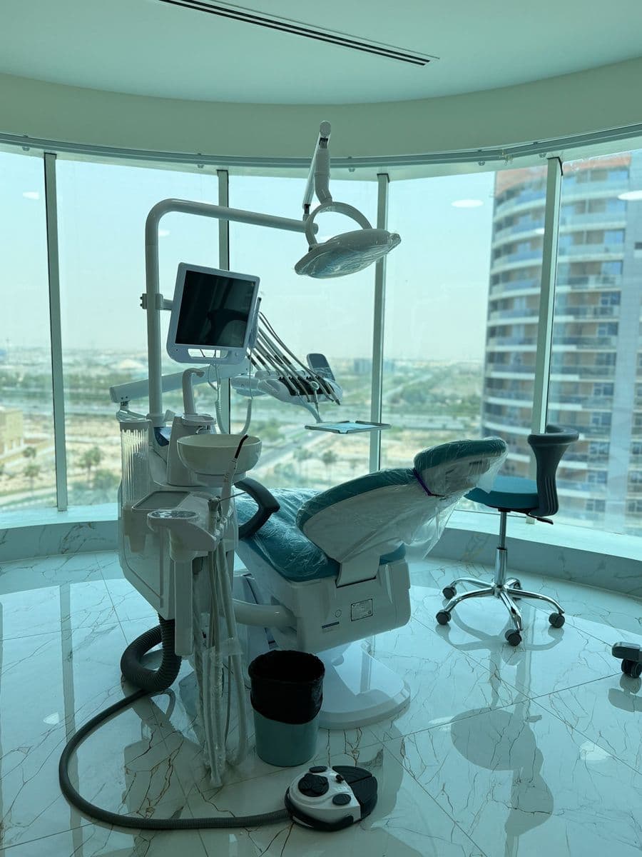 Treatment chair with city views at Shanu's Dental